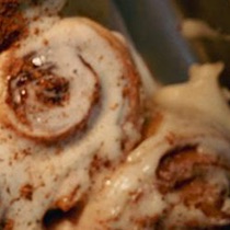 Attempt four: an iced roll with a tight open swirl.